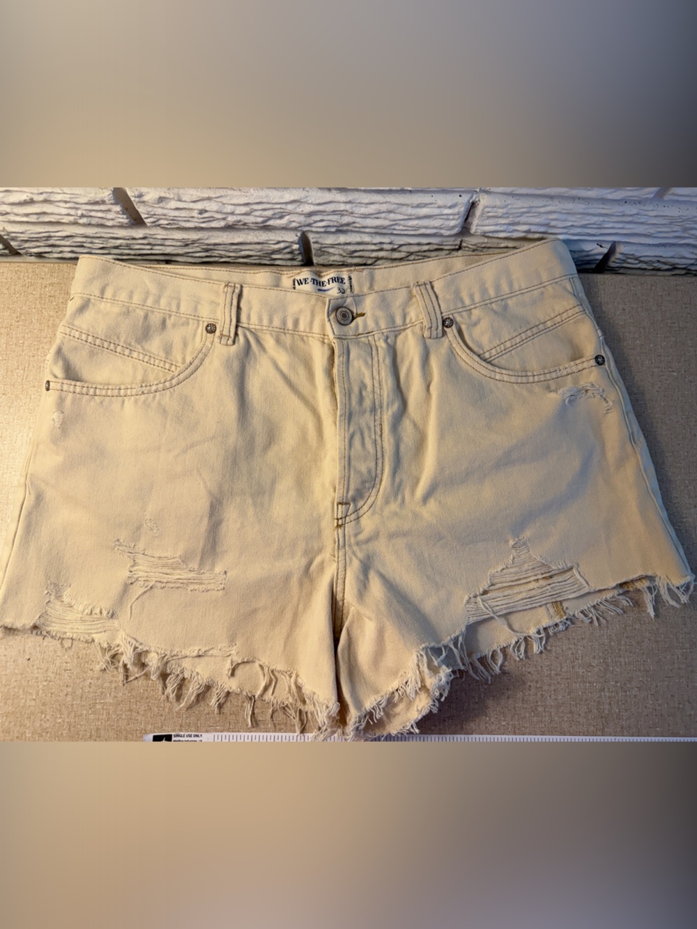 We The Free Cream Distressed High-Rise Denim Shorts